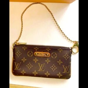 Authentic Louis Vuitton Vintage Pochette w/ original LV gold chain.